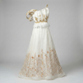 White Lotus handcrafted white organza silk evening gown with gold floral embroidery by Fatima Farzana